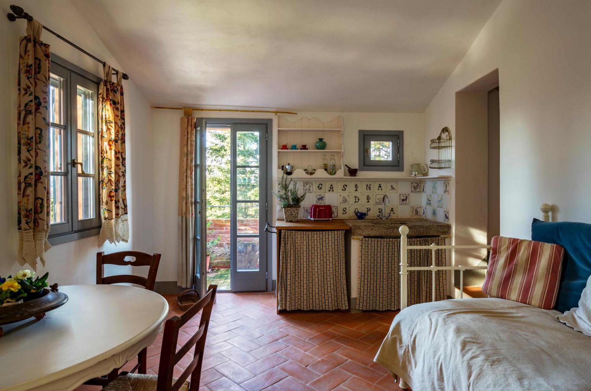 Casa Ezio Marchi - Due Appartamenti E Una Family Suite Bettolle Bagian luar foto