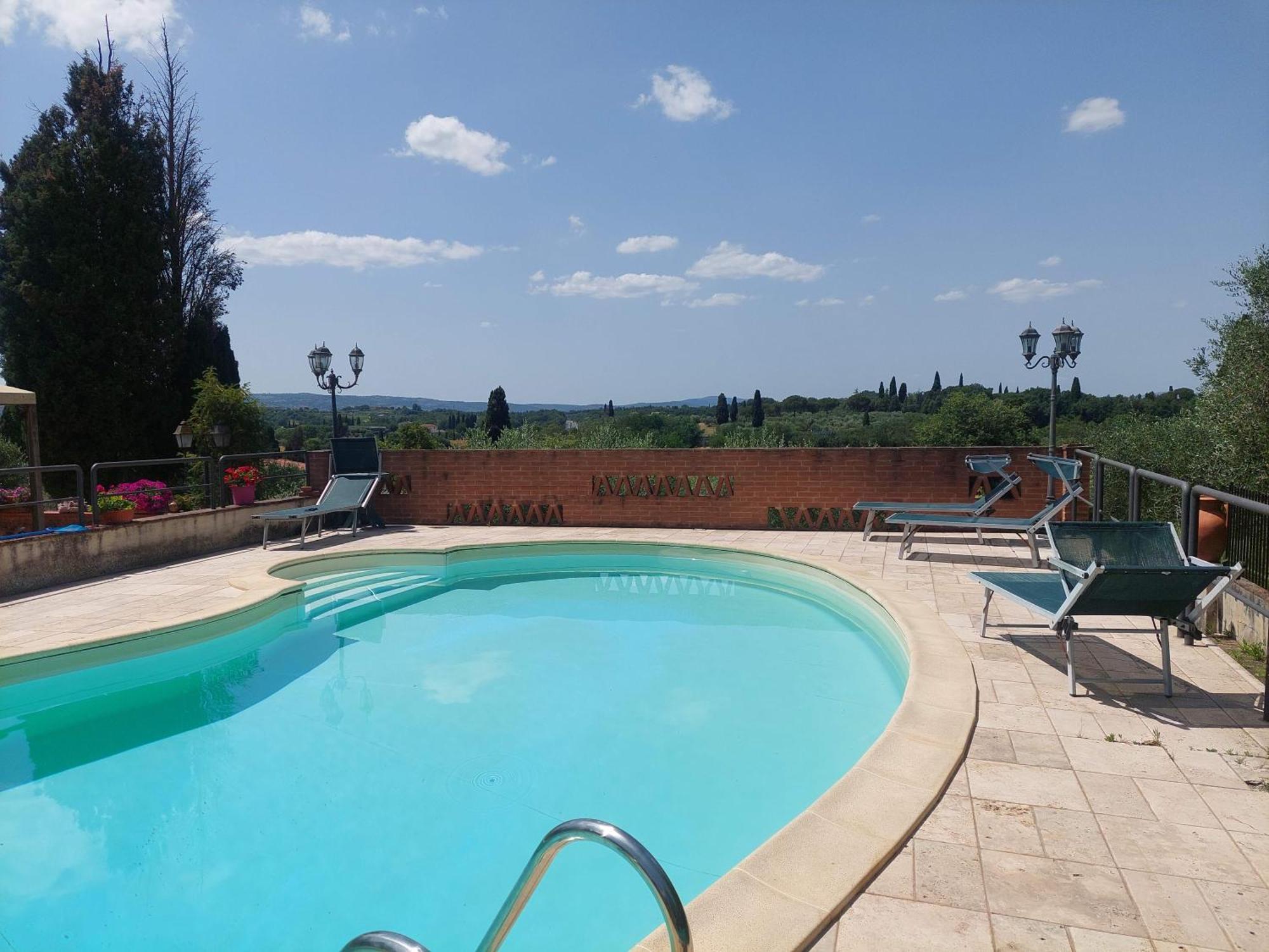 Casa Ezio Marchi - Due Appartamenti E Una Family Suite Bettolle Bagian luar foto